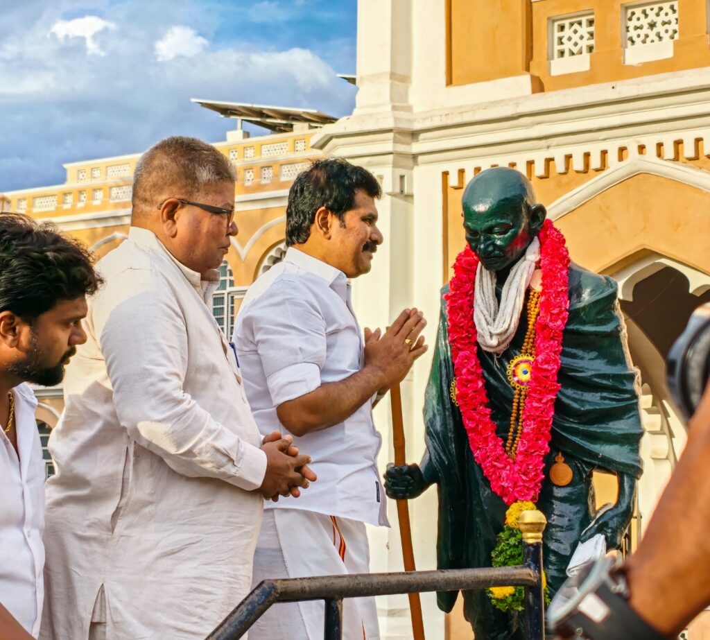 CTR Nirmal Kumar garlands the statue of Mahatma Gandhi at Gandhi Memorial Museum in Madurai